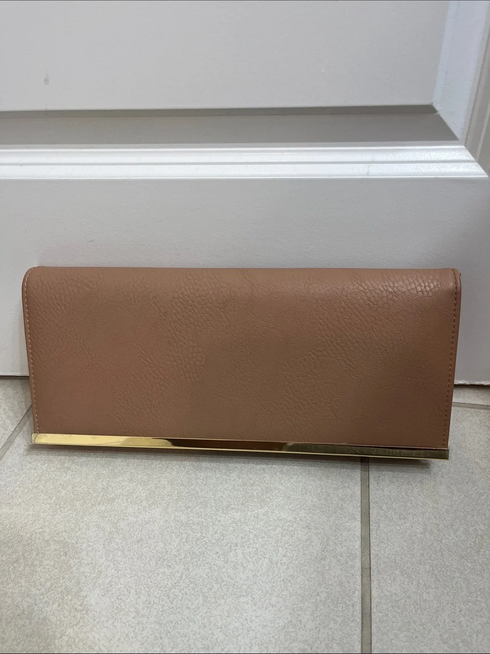 Charming Charlie Tan Clutch with Gold Bar Trim